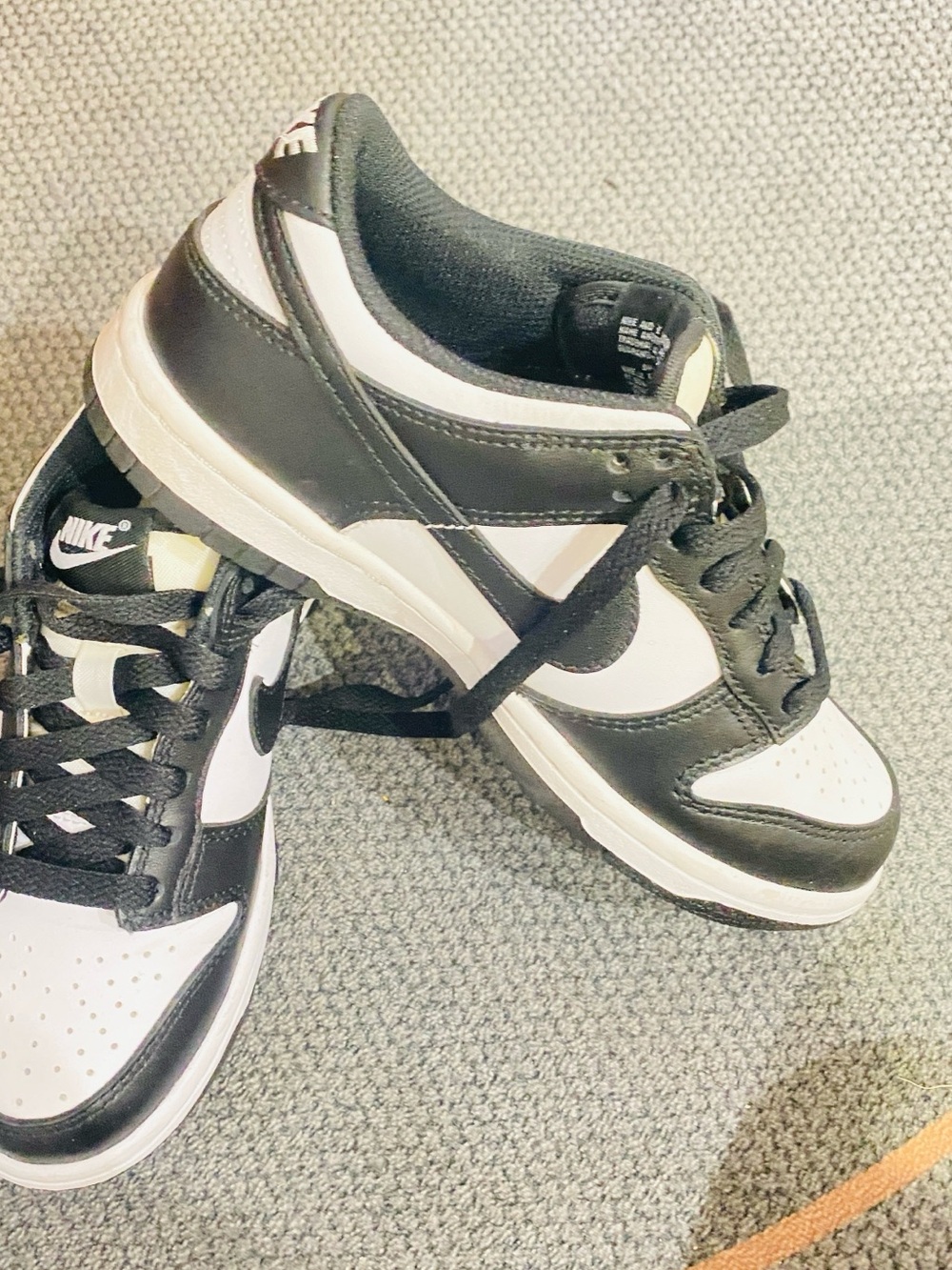 Nike Women’s Black and White Low-Top Sneakers with Swoosh
